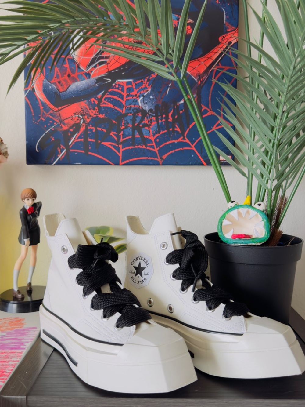 Chuck 70 De Luxe Squared Hi with black chunky laces